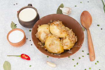 beautifull ukranian food on the traditional table with green, salt, pepper, spices 