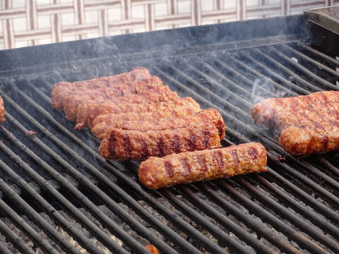 Meat (mici) on the grill. In Romania