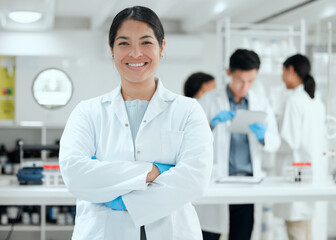 Portrait, arms crossed or woman with smile in laboratory for science breakthrough, clinical trial...