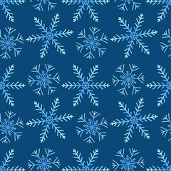 Repeating raster pattern with blue gradient snowflakes on blue background
