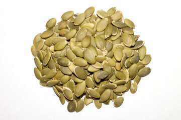 Peeled pumpkin seeds.Pumpkin seeds background.