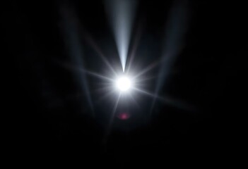 a bright light flare in the center of an inky black void, radiating intense beams of light outward create with ai
