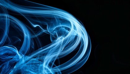Fototapeta premium Abstract blue smoke swirls on black background.