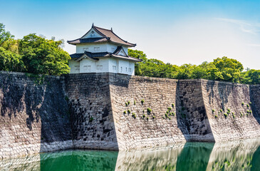 Obraz premium View with Rokuban-yagura Turret within Osaka Castle, Japan. The massive stone wall outer moat of Osaka Castle