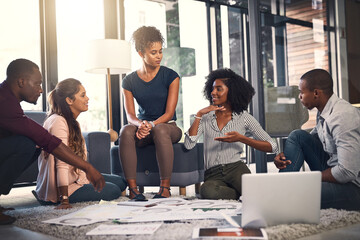 Fototapeta premium Business people, working and office floor with meeting and content creation planning and talk. Teamwork, laptop and web creative agency with SEO update strategy with diversity and startup notes