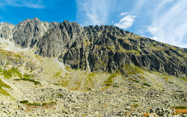 Mountain ridge seen from the valley in autumn colors on a beautiful sunny day.