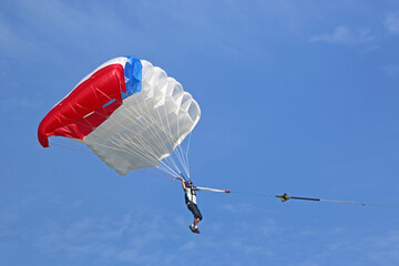 Classic Paraglider being towed by a winch	