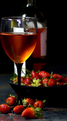 glass of rose wine and berries. High quality photo