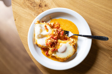 food, breakfast, shakshuka in a white plate on the table