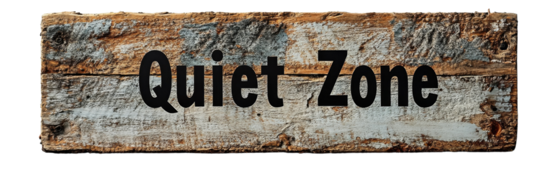 Quiet Zone sign on rustic wooden board conveys sense of calm and tranquility, perfect for designating peaceful areas
