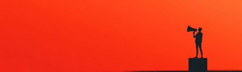 Statue of a man holding a megaphone on a pedestal