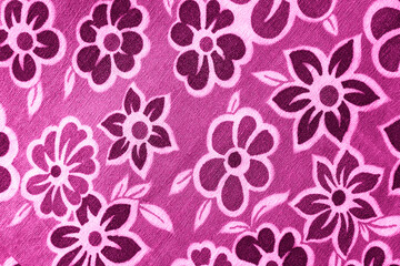 pink floral pattern on fabric.  wallpaper in a rustic modern design.   pink textile texture.