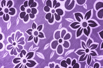 lilac floral pattern on fabric.  wallpaper in a rustic modern design.   lilac textile texture.