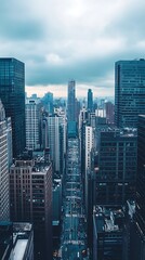 Obraz premium Aerial view of a city with skyscrapers and cloudy sky, urban landscape photo