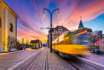 Oradea, Romania. Tram station in Union Square, beautiful city architecture in Crisana, Transylvania.