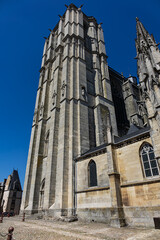 Fototapeta premium Architectural fragments of Le Mans Roman Catholic cathedral of Saint Julien (Cathedrale St-Julien du Mans, VI - XIV century). Le Mans, Pays de la Loire region in France.