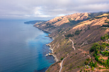 Highway 1 and Big Sur along the Pacific Ocean coast, beautiful landscape and aerial view, sunset, sunrise, fog. Concept, travel, vacation, weekend