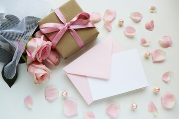 greeting card. rose bouquet and gift box with bow	