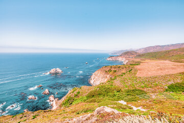 Beautiful landscape of Pacific Ocean coast along Highway 1 and Big Sur, aerial view, sunset, sunrise, fog. Concept, travel, vacation, weekend