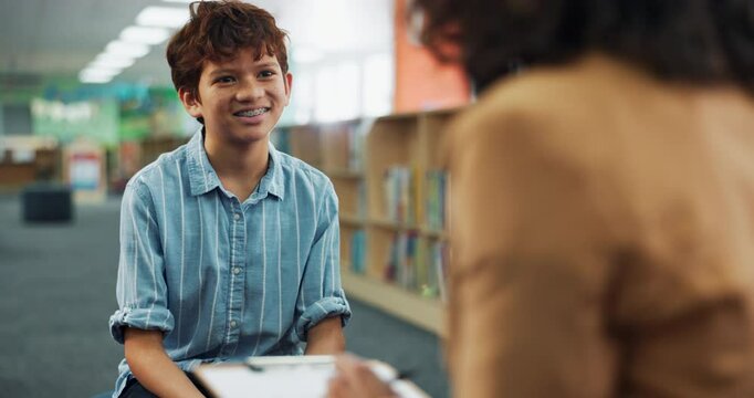 Psychology, clipboard and school counselor with student for adhd test with behavioral chart in library. Consultation, write and education therapist with kid for learning challenge, autism or dyslexia