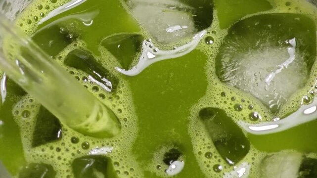 Matcha close up. Healthy iced matcha in a glass.