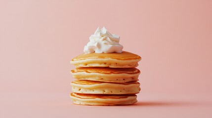 Stack of pancakes with a dollop of whipped cream, isolated on a pastel peach background, sweet and fluffy breakfast.
