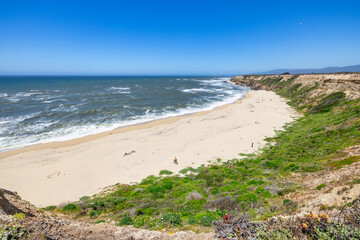 Cowell Ranch beach with ocean waves near Half Moon Bay on the California coast. Beautiful scenery, concept of rest, vacation, tourism
