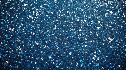 Obraz premium vibrant top view of blue granulated rubber flooring, showcasing mix of blue and white speckles that create dynamic and textured surface. This flooring is ideal for various applications, adding modern