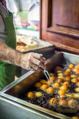 Bunuelos at Colombian Street. Traditional Colombian food