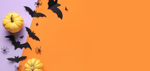 Paper bats, spiders and fresh pumpkins for Halloween party on colorful background with space for...