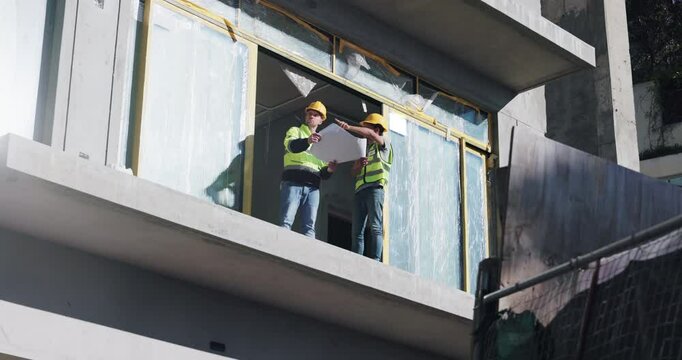 Colleagues, engineer and men with blueprint, site and inspection of balcony, planning and people in construction. Architecture, paperwork and ideas for design, renovation and maintenance of building