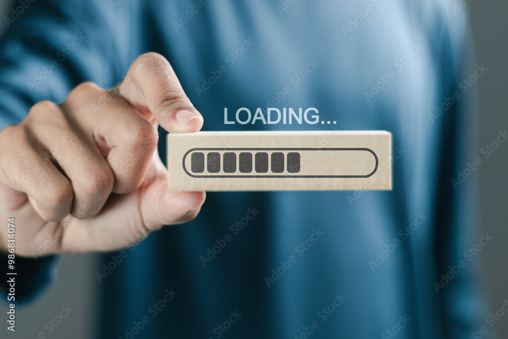 Poster person holding wooden block with loading bar progress for information download data concept.