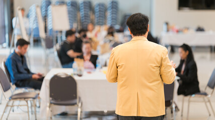 Speaker Leading Business Workshop for Professional Audience. A presenter conducts a business...