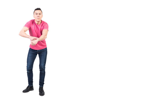 Unsatisfied man pointing on wrist due to late