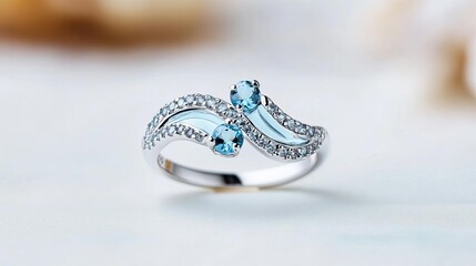 Wave-pattern ring with aquamarine stones, capturing oceanic beauty