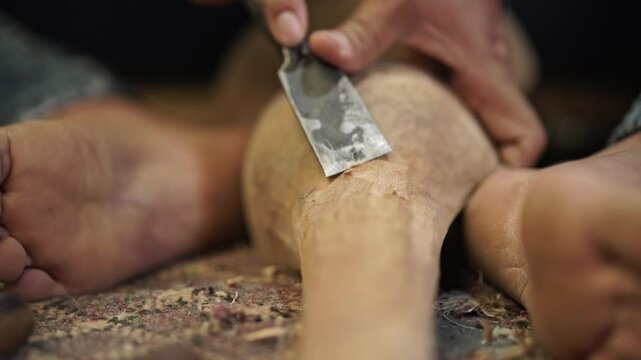 Tungna, Dramyin Folk Instrument making and wood carving by a local Instrument maker in Nepal