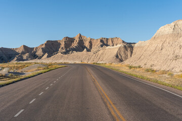 A road with a mountain in the background