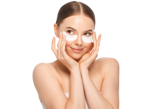 Young beautiful girl in process of morning beauty routine, applying eye patches, touching them with fingers