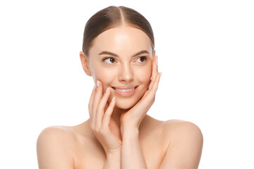 Beauty portrait of young woman looking right, holding hands near face with clean skin