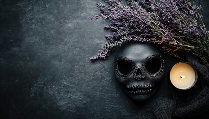 Dark, eerie Halloween scene with black skull mask, purple flowers, and candle on textured background.
