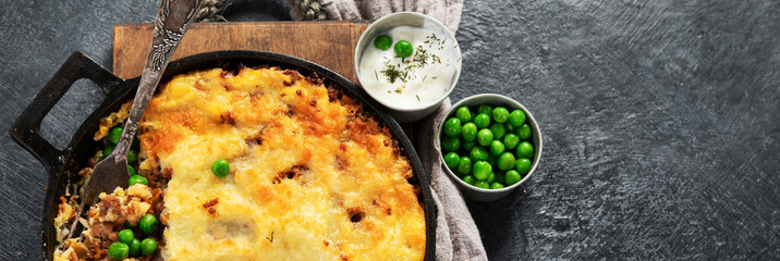 Shepherd’s Pie - ground meat with vegetables, topped with mashed potatoes, and cheese. Baked.