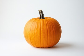 Obraz premium A Single Orange Pumpkin with a Brown Stem