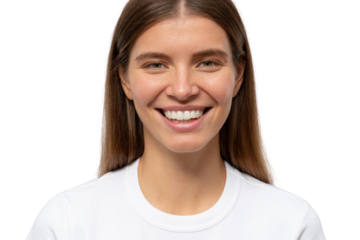 Close-up portrait of positive cute millennial student girl in white t-shirt with candid toothy smile