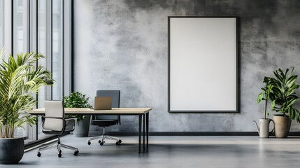 Empty poster frame in a modern office interior on a concrete wall, with natural light from windows.
