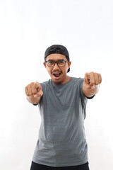 Fototapeta premium Young handsome asian man with beard wearing casual shirt and glasses over white background pointing to you and the camera with fingers, smiling positive and cheerful