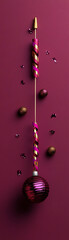 Fototapeta premium Elegant holiday ornament with colorful ribbons on a deep burgundy background.