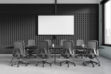 A modern conference room with a blank screen on a textured wall, featuring ergonomic chairs around a table. Minimalist design, office interior. 3D Rendering