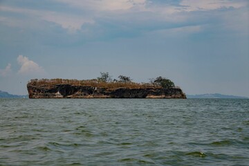 small sparse rock island on Lake Victoria in Uganda