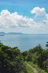 A beautiful trail from Lamma Island hiking trails from Sok Kwu Wan and ling kok shan with the blue ocean and clouds in the background