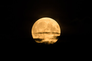 Beautiful bright and vivid landscape or background of large fool shiny romantic or horror Moon with...